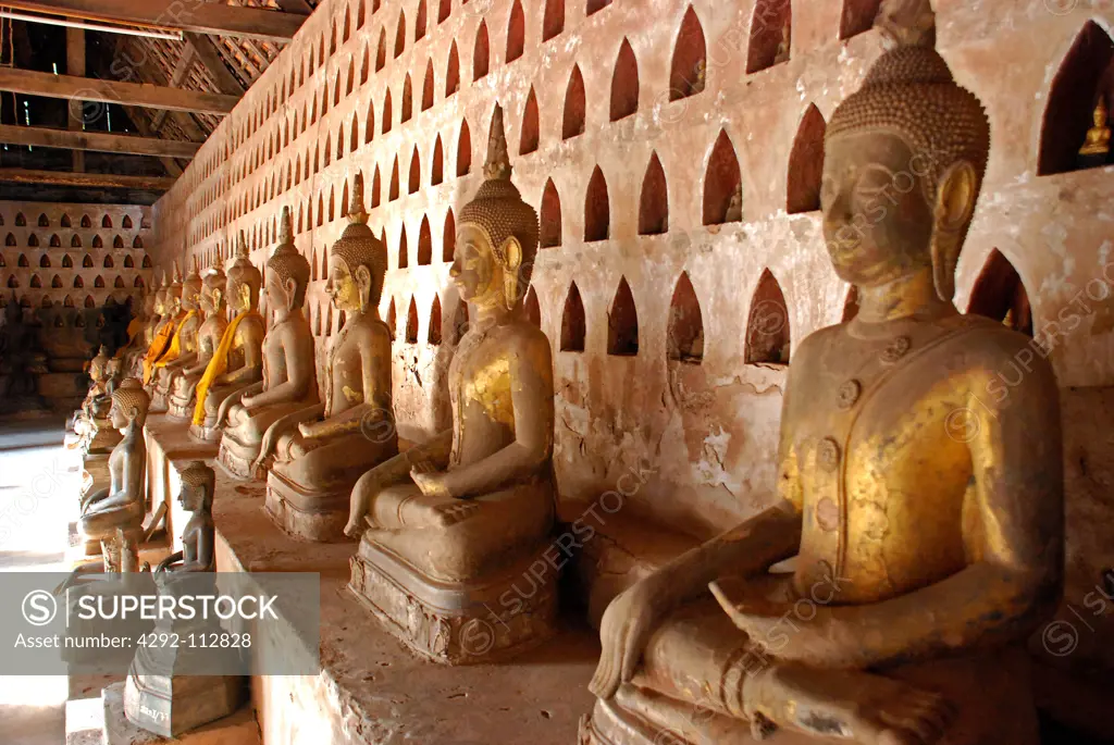 Laos, Vientiane, Series of Buddha Statues in Wat Sisaket.
