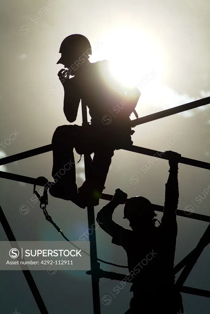 Construction worker on scaffolding.