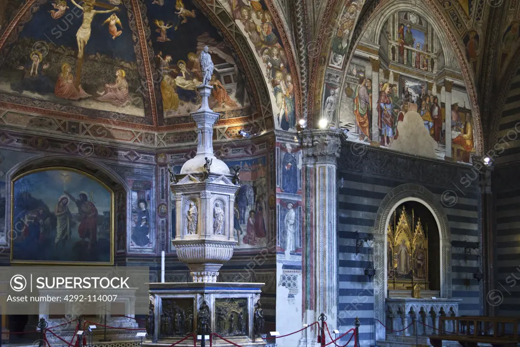 Italy, Tuscany, Siena. Interior of the Duomo, Baptismal Font.