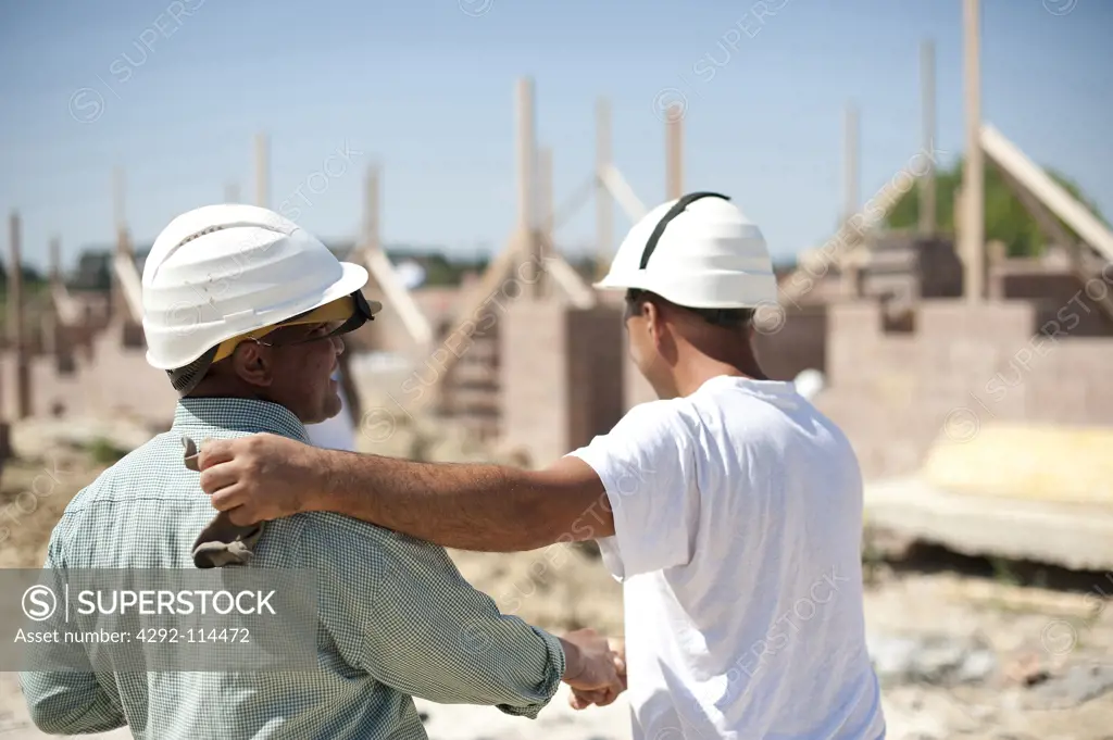 Manual workers at construction site