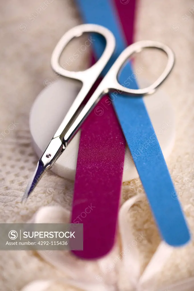 Nail file, scissors, and cosmetic cleaning pads