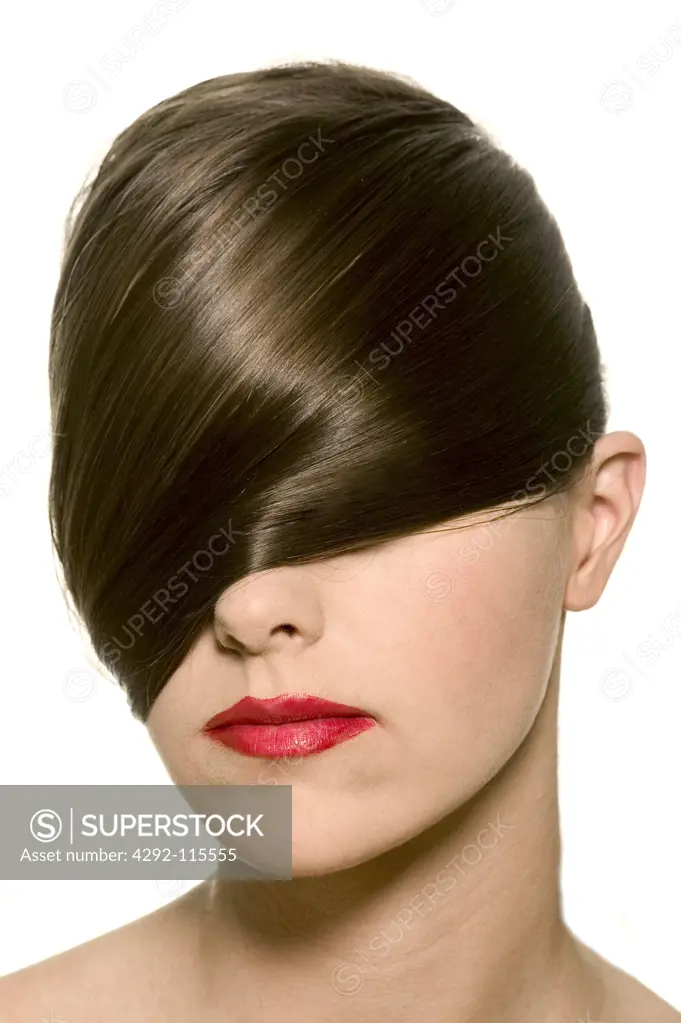 Woman with hair covering her eyes