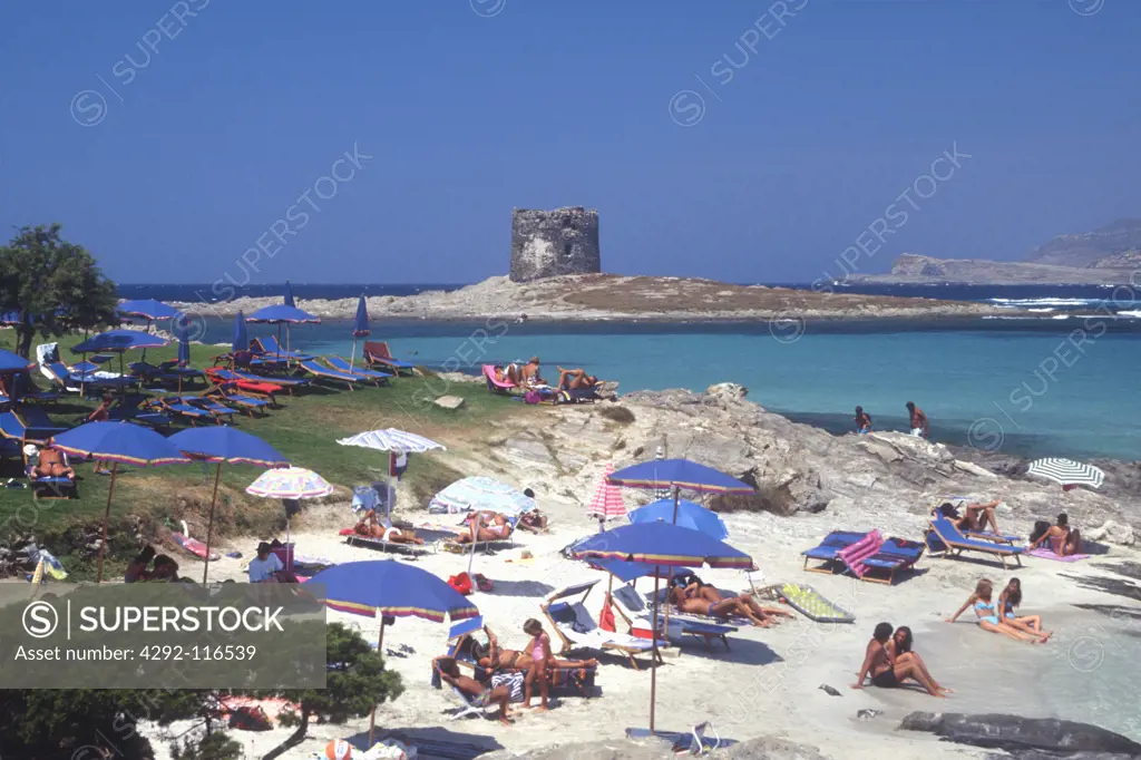 Italy, Sardinia, Stintino, the beach of Capo Falcone and the ruins of Torre Pelosa