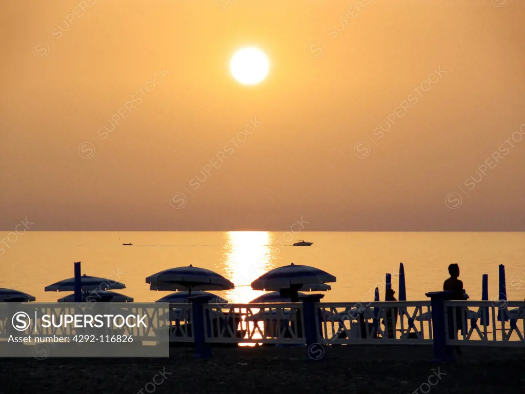 Italy, Calabria, Praia a Mare, beach at sunset