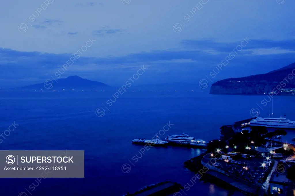 Italy, Campania, Sorrento, Marina Grande and the Vesuvius at night