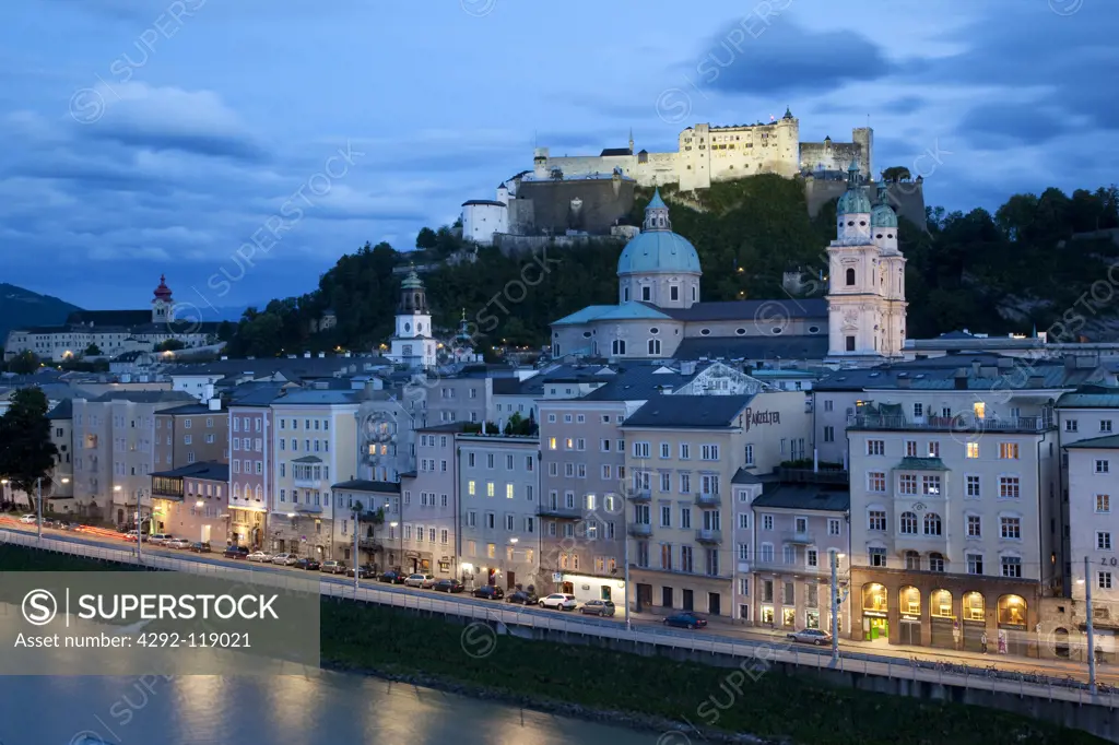 Austria, Salzburg, Hohensalzburg castle and town at dusk