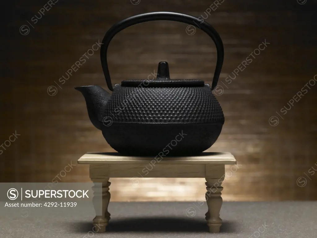 Teapot and table still life