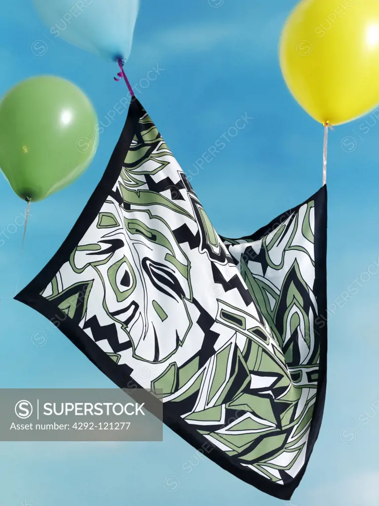 Shawl hanging on balloons