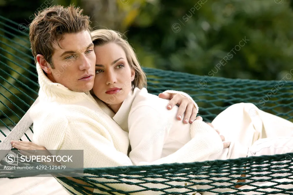 Couple lying in hammock
