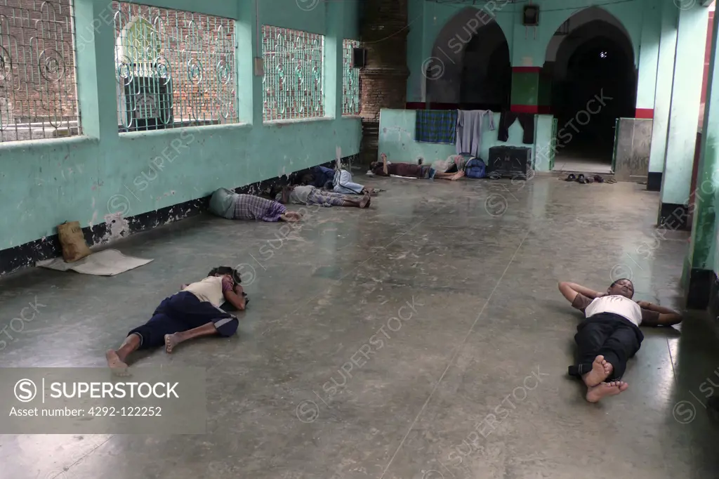 Bangladesh, Bagerhat, people sleeping inside mosque