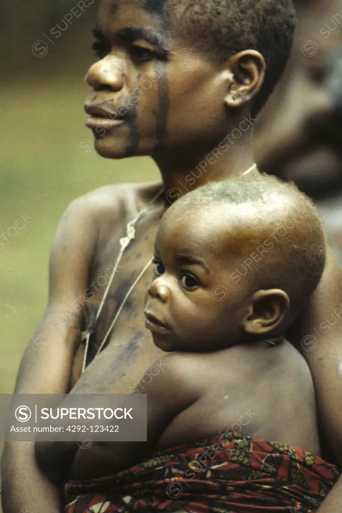Africa, Zaire. Pygmy woman with baby
