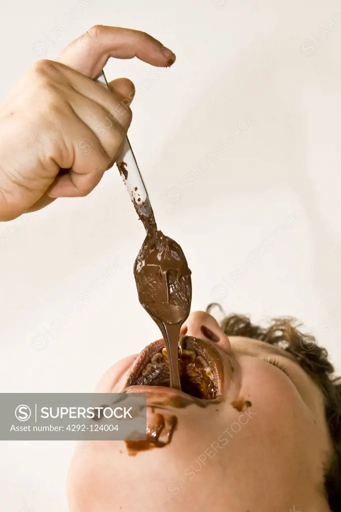 Boy eating chocolate