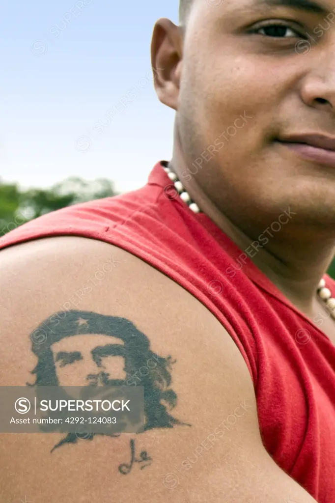 Cuba,  Havana, young man with Che Guevara tatoo