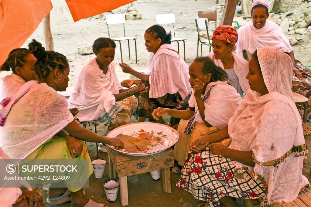 Africa, Eritrea, Massawa, women eating