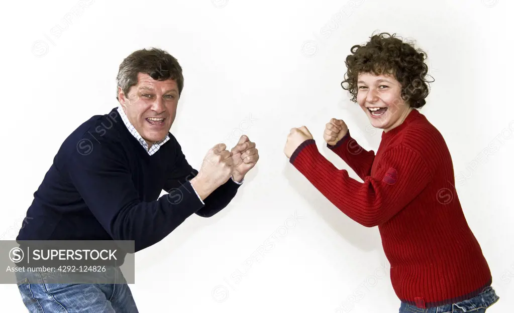 Father and son playing boxe