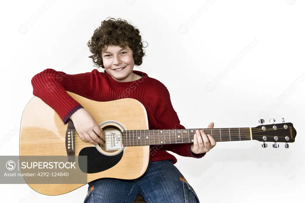 Teenage boy with guitar