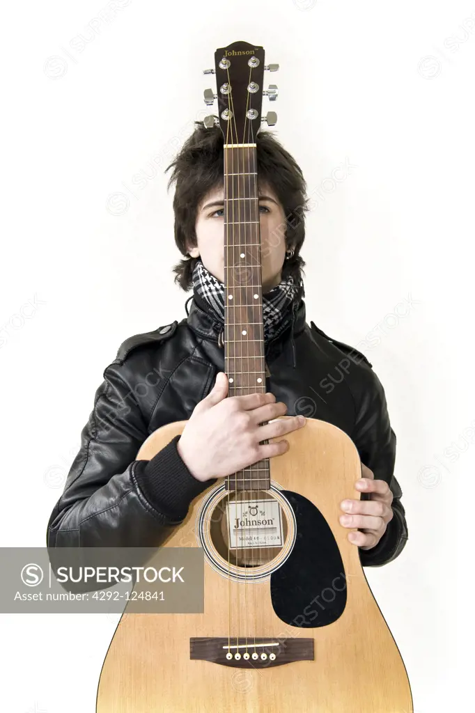 Teenage boy with guitar