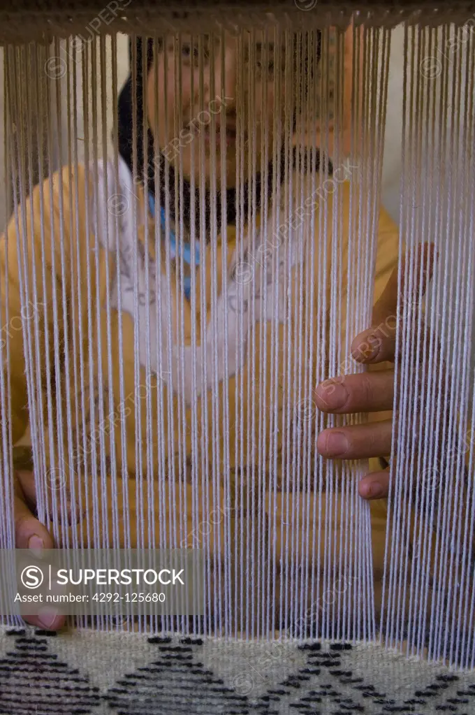 Morocco,Jebel Siroua, weaver