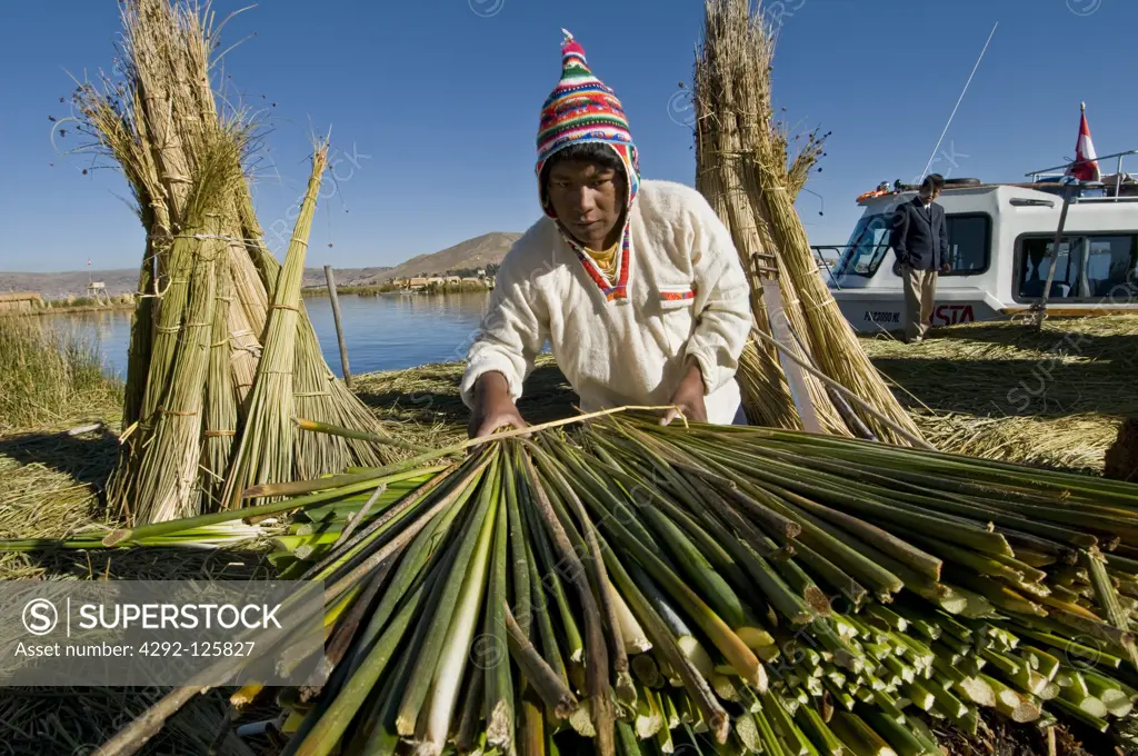 Lake Titicaca, Uros Indian man in Uros islands, Peru
