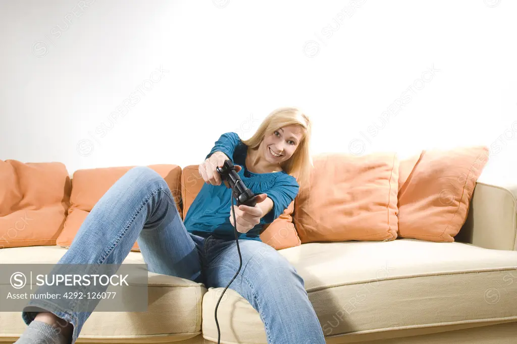 Girl at home playing video games
