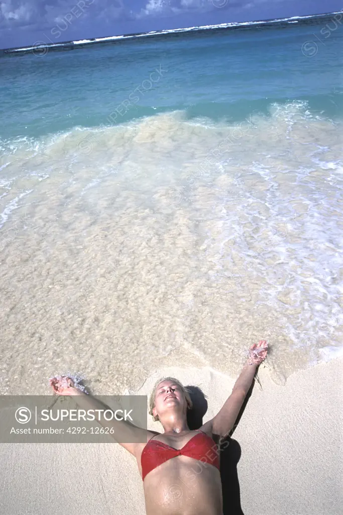 Young woman enjoying the waves