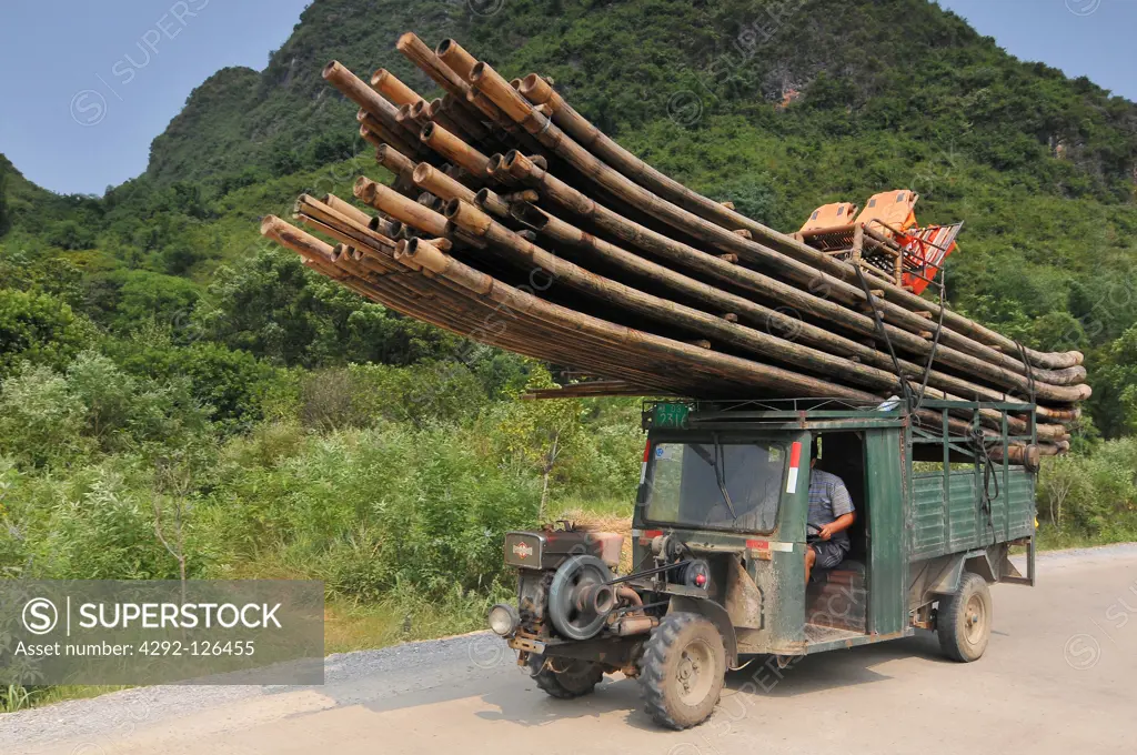 China, Yangshou County, truck transporting rafts