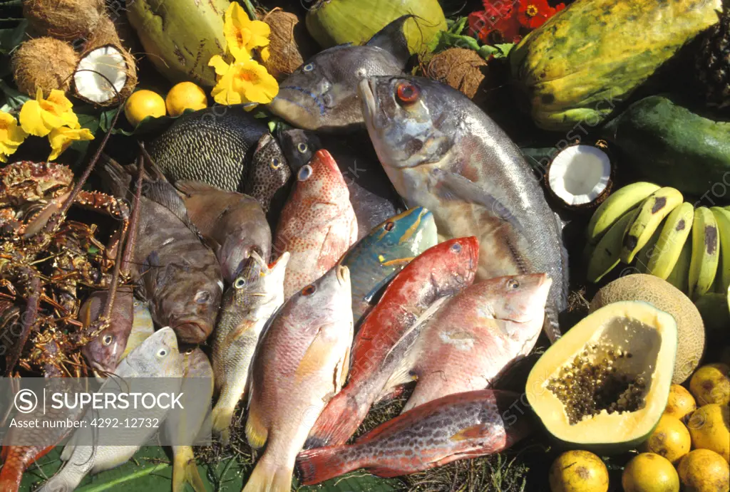 Buffet with fishes and tropical fruits