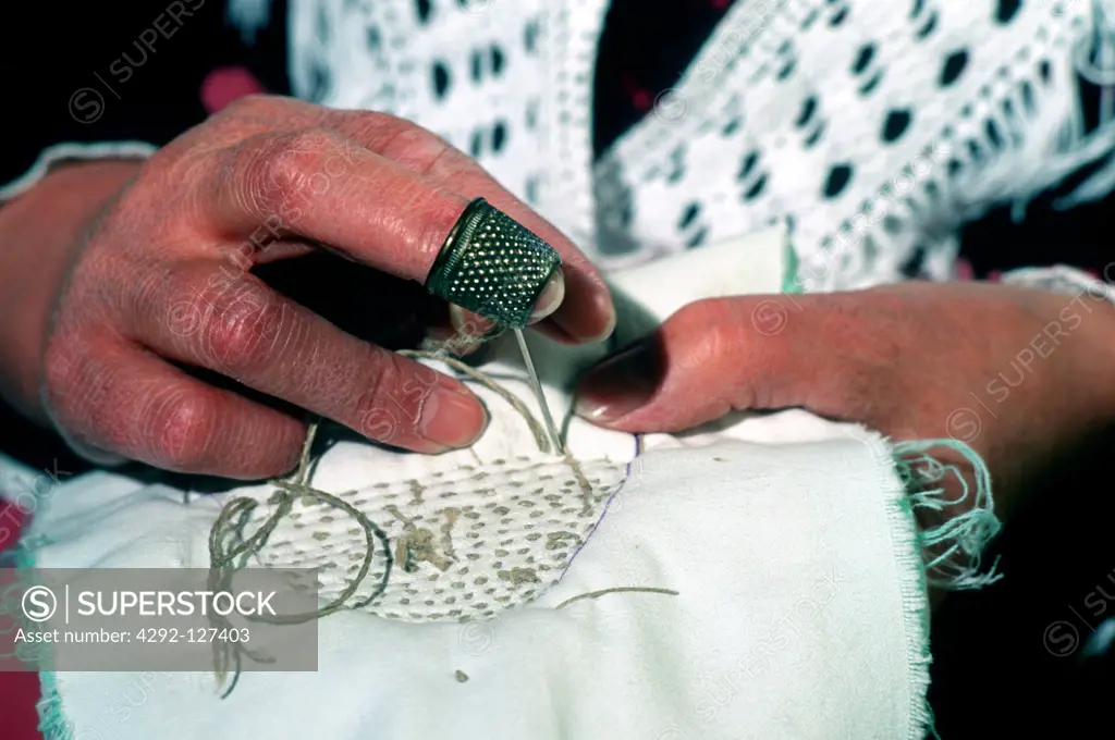 Italy, Friuli Venezia Giulia, Comeglians, Woman Working at Scarpetz Typical Shoes