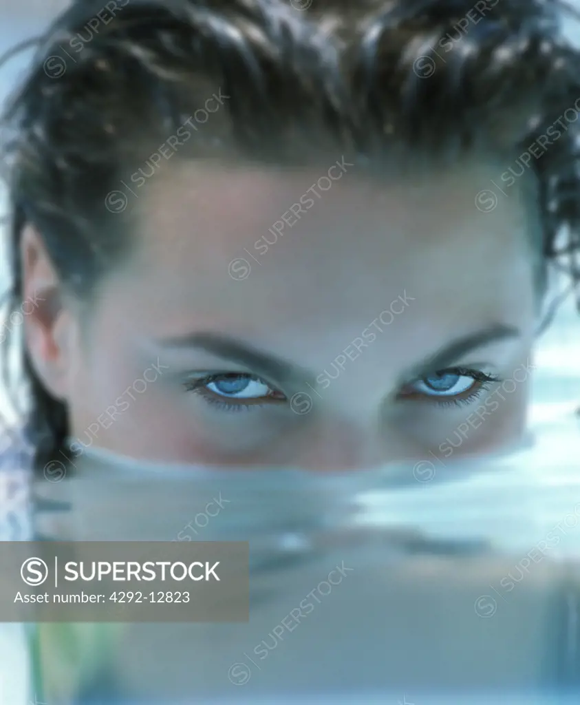 Close up of a woman surfacing