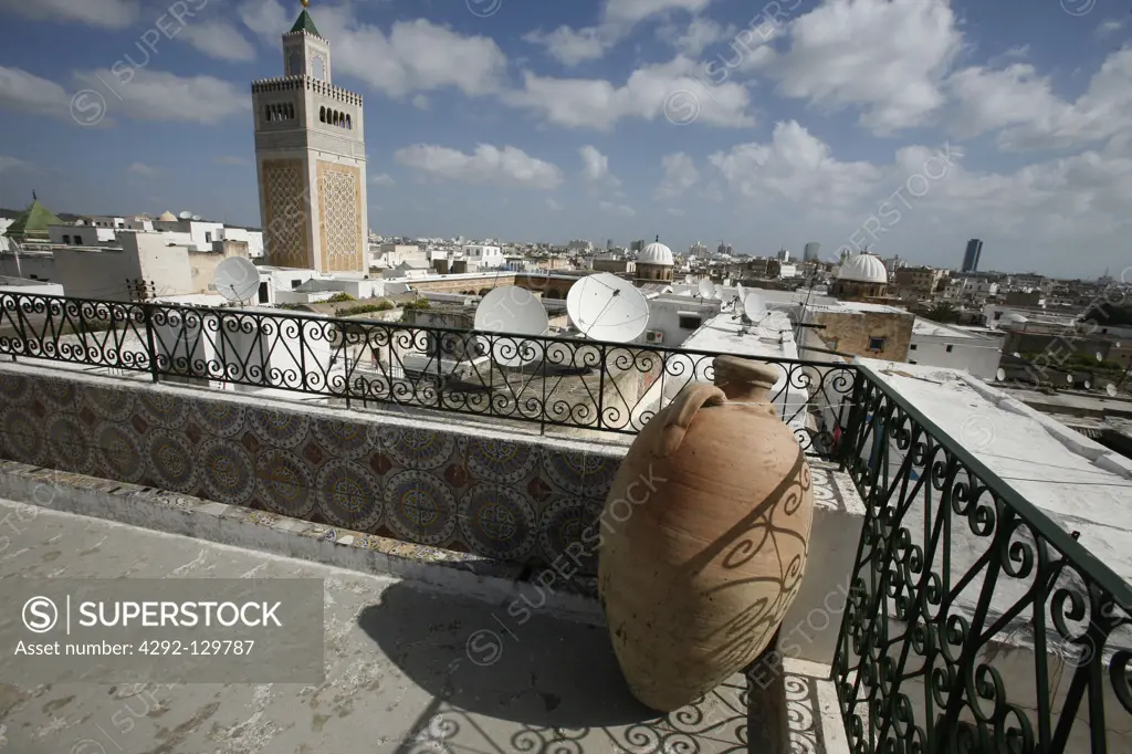 The minaret of the MoscheeZaytouna or big mosque in the Old Town or Medina of the capital of Tunis in the Norder of Tunisia in North Africa at the Mediterranean Sea.