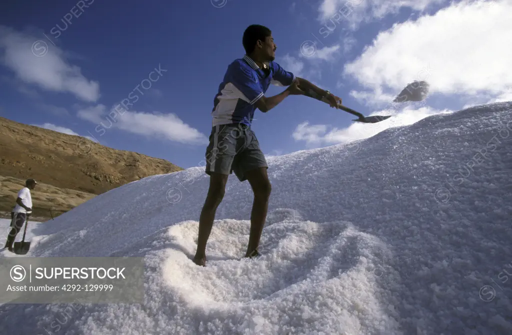 A worker in the saltwork of Pedra de Lume on the island Sal on the island group of the Kapverden before Africa in the Atlantic.