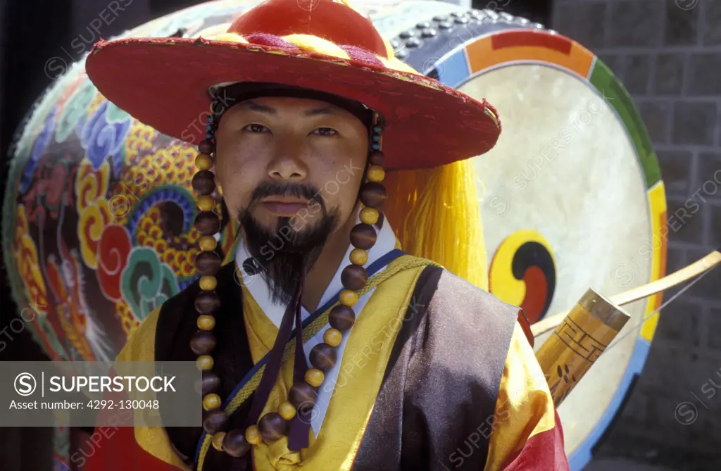 A drummer stands in the Toksugung palace in the centre in the capital of Seoul in South Korea in the east Asia.