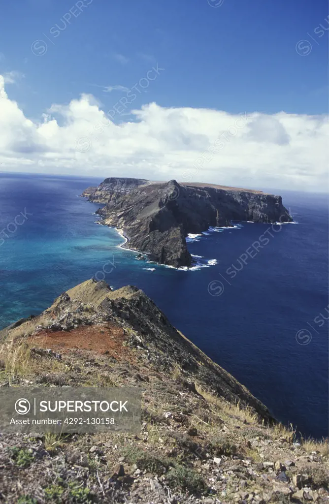 The coasts scenery with the island Ilheu de Baixo in sueden of the Portuguese island postage Santo with Madeira in the Atlantic