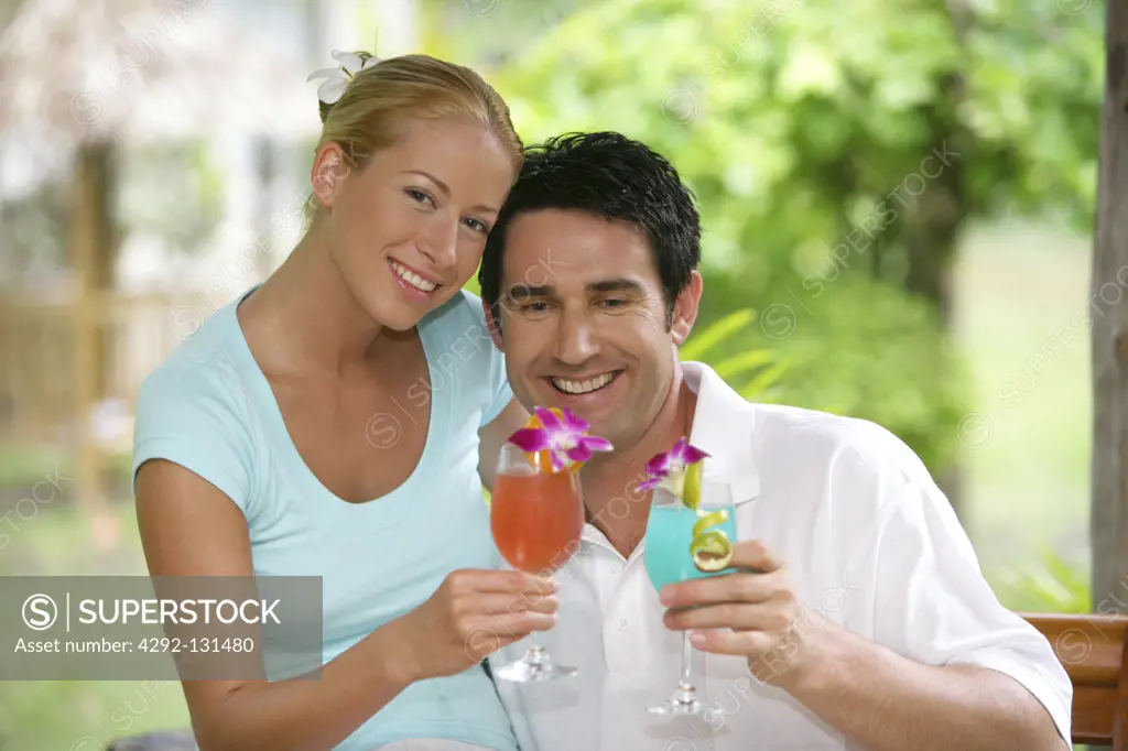 couple in love enjoy some drinks on holidays in