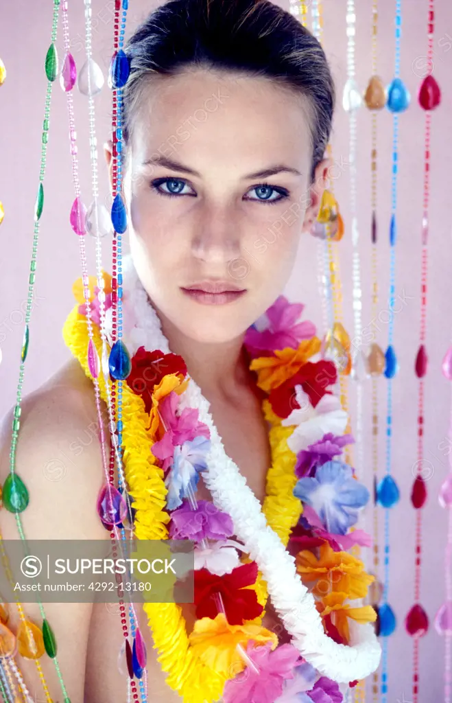 Woman with necklaces made of flowers
