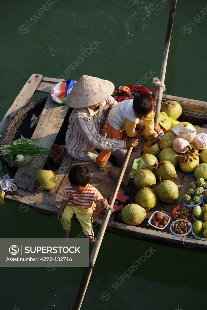 Selling fruit on Halong Bay