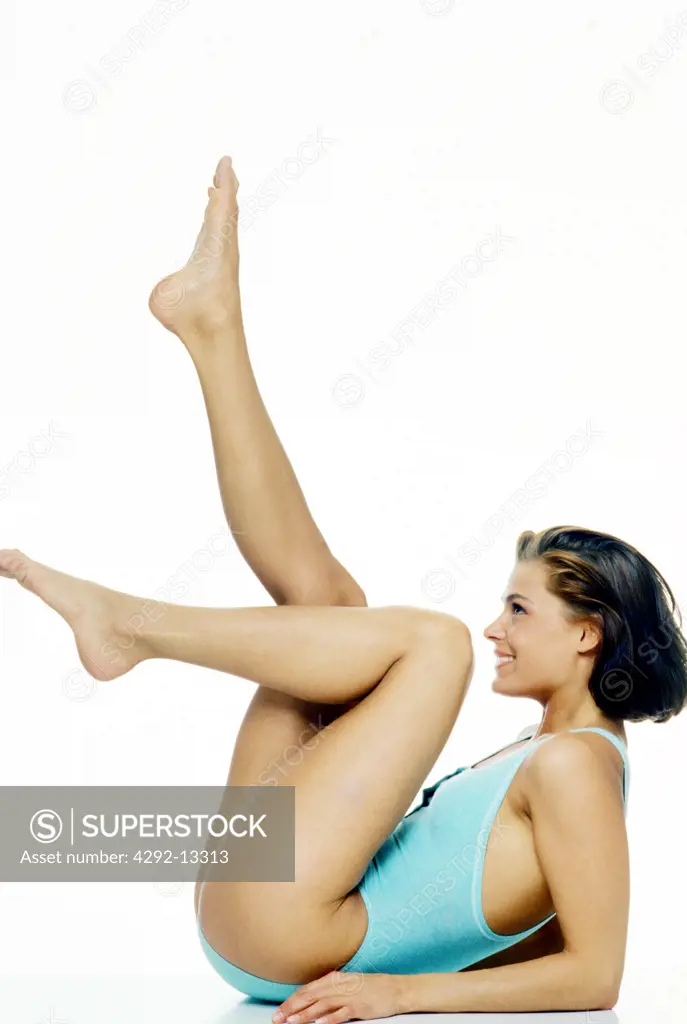 Woman in underwear moving legs