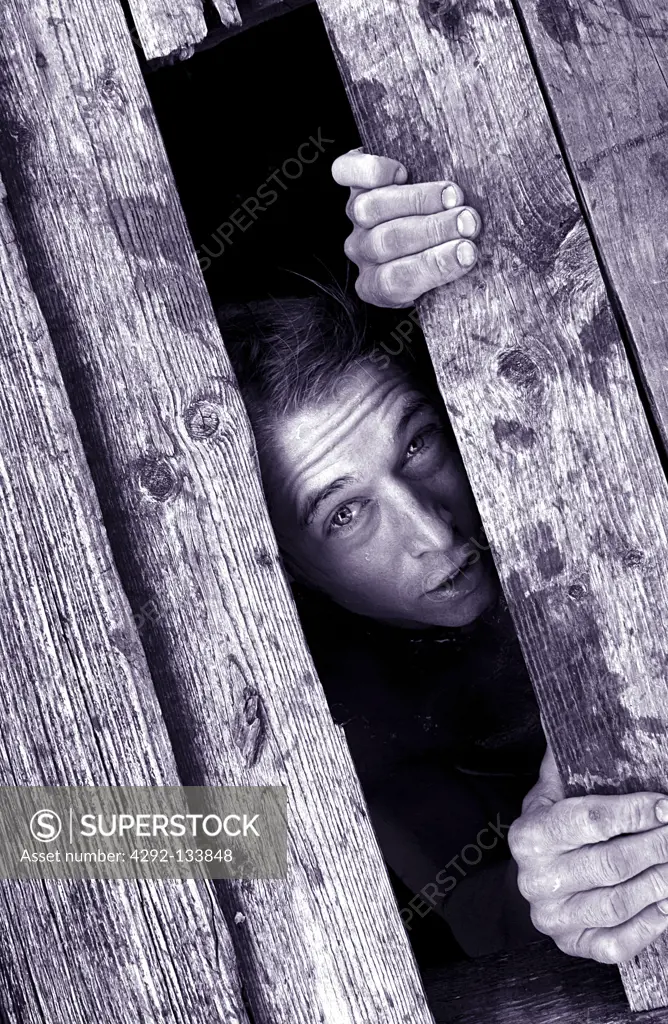 A Man Trapped Under Planks