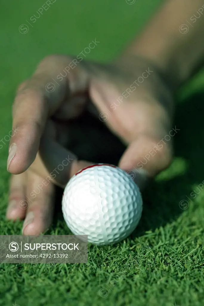 Hand play with golf ball
