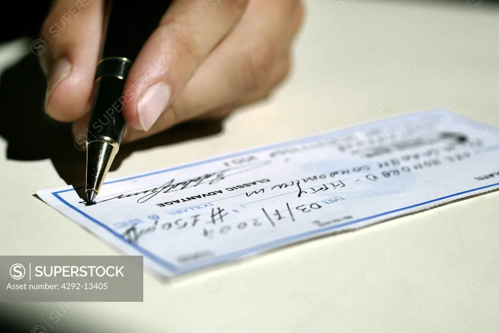 Hand signing cheque