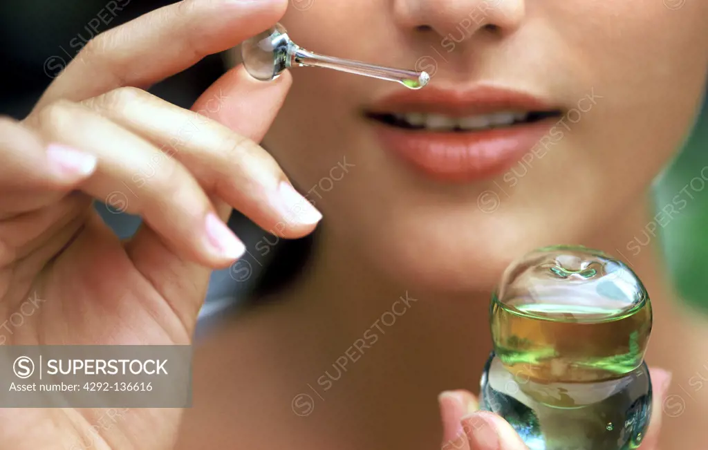 Aromatherapy, woman smelling perfume