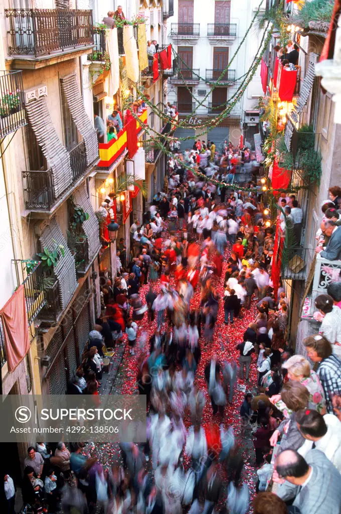 Spain, Valencia, Corpus Christi celebrations with confetti falling on streets of