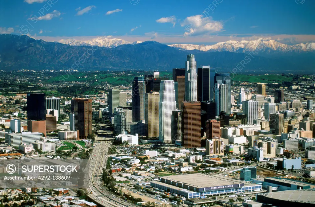 USA, California, aerial view of downtown Los Angeles, Civic Center with snow covered San Gabriel Mountains