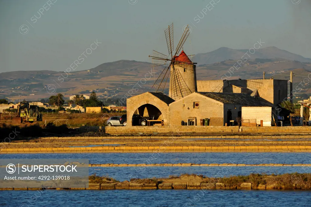 Italy, Sicily, Trapani, Salt ponds and Nubia windmill