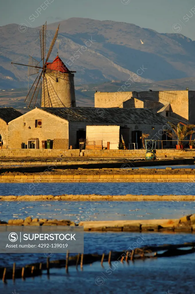 Italy, Sicily, Trapani, Salt ponds and Nubia windmill