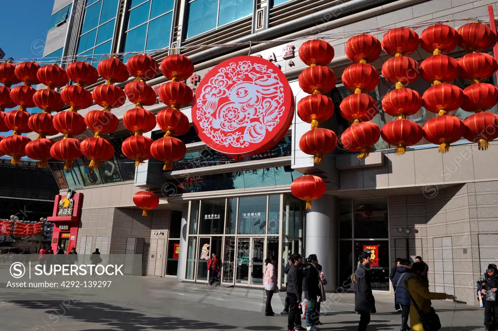 Asia, China, Beijing, red lanterns for the new year at the entrance of a mall