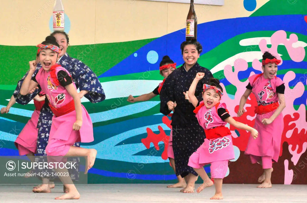 Naha, Japan, sake-dance show during the Dragon Boat Festival, May)