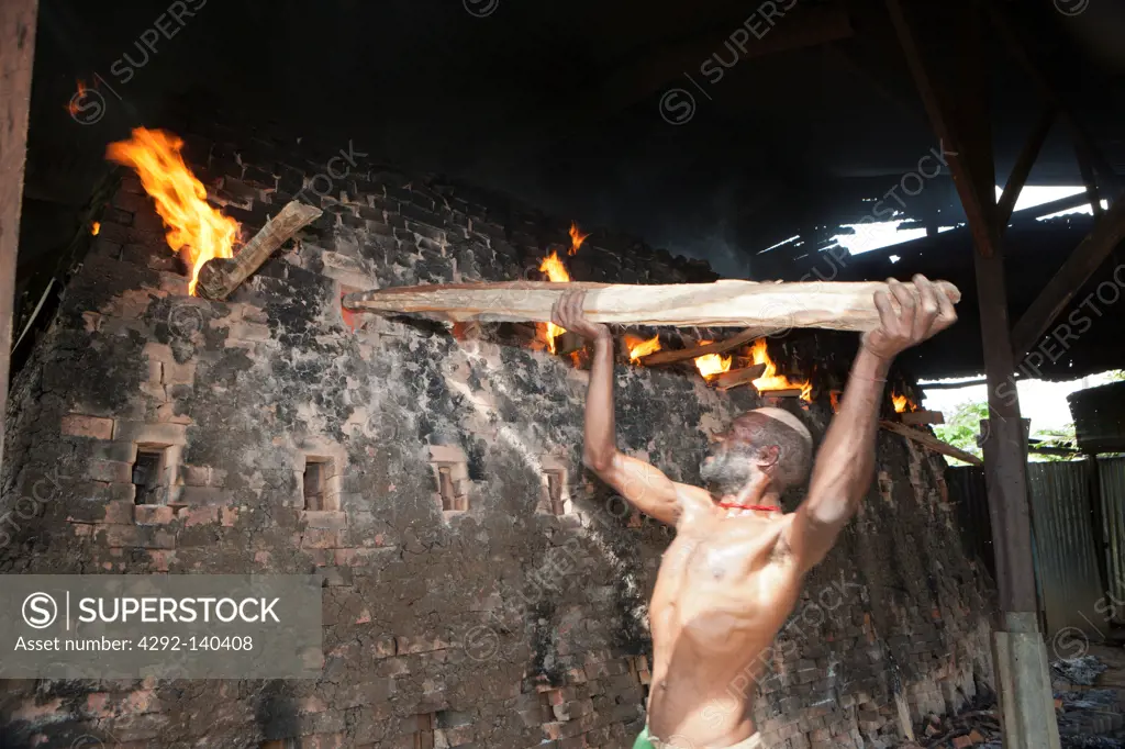 Brick Burner in Brick factory at Wamena, Baliem Valley, West Papua, Indonesia