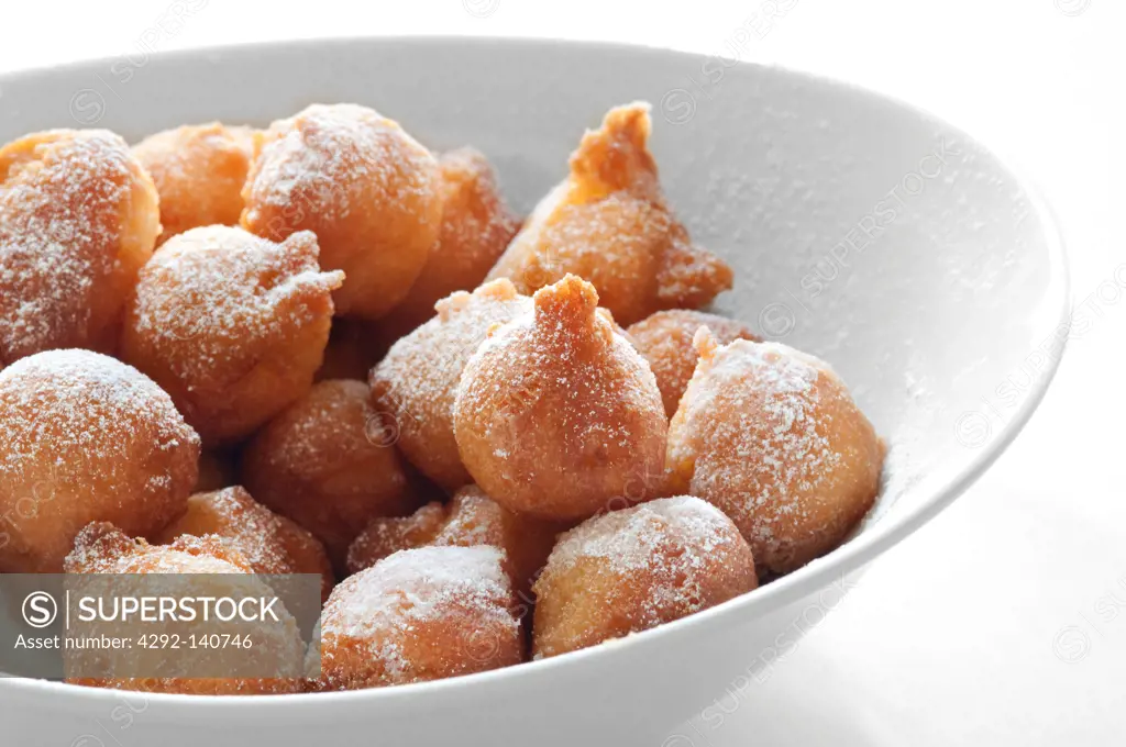 Italy, Lombardy, Castagnole, Traditional Carnival Sweet with Powdered Sugar