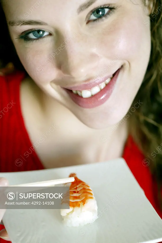 Woman portrait with sushi plate